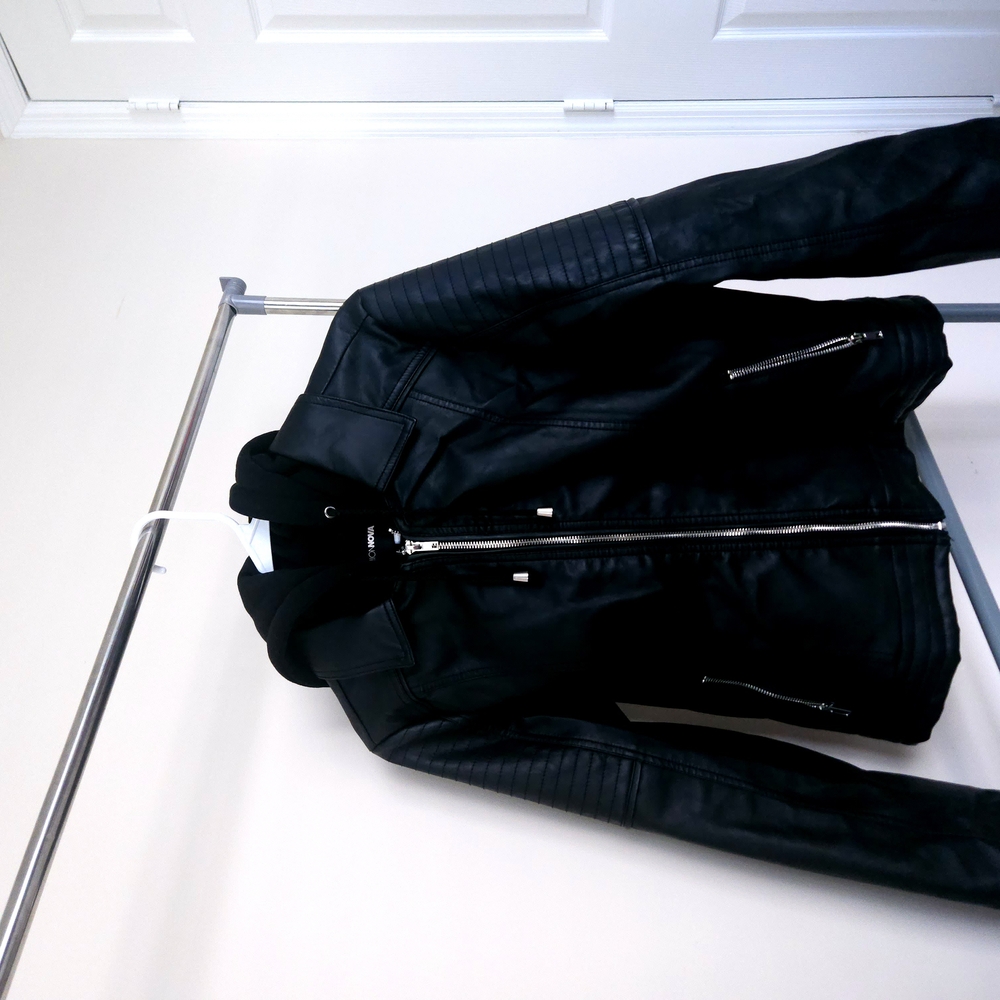 Black Leather Jacket with Zipper Details